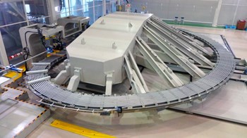 The first dummy regular superconducting double pancake wound by MELCO in MHI's Futami factory. Each toroidal field coil is constituted from seven double pancakes. (Click to view larger version...)